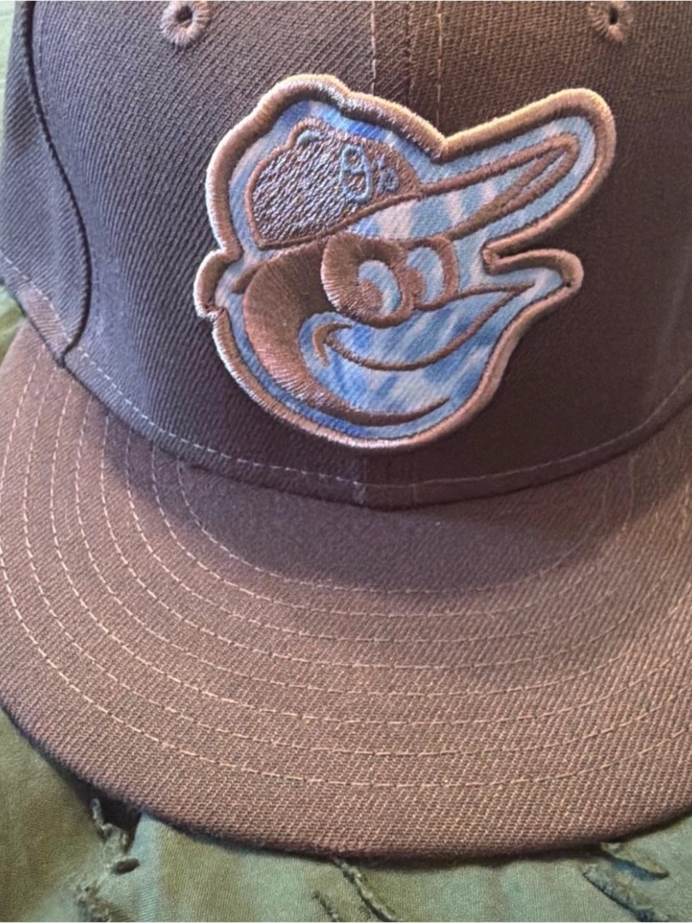 New Era Black Cap with Blue & Brown Embroidered Logo Patch